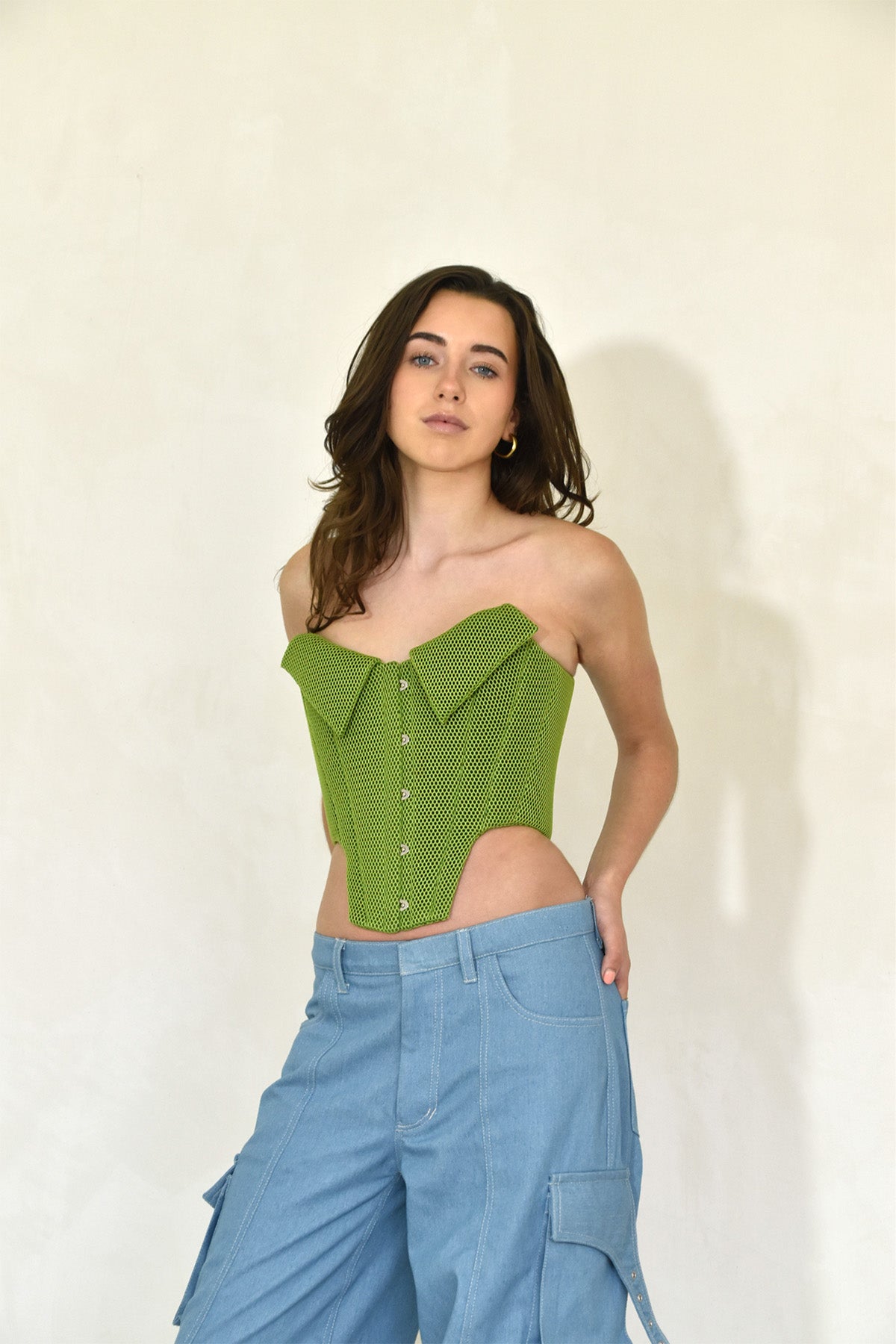 Green neoprene corset side front view