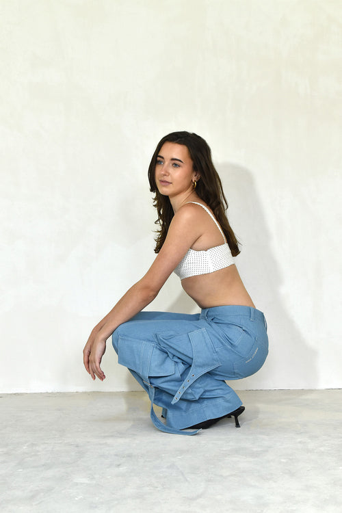 side kneeling down view utility jeans