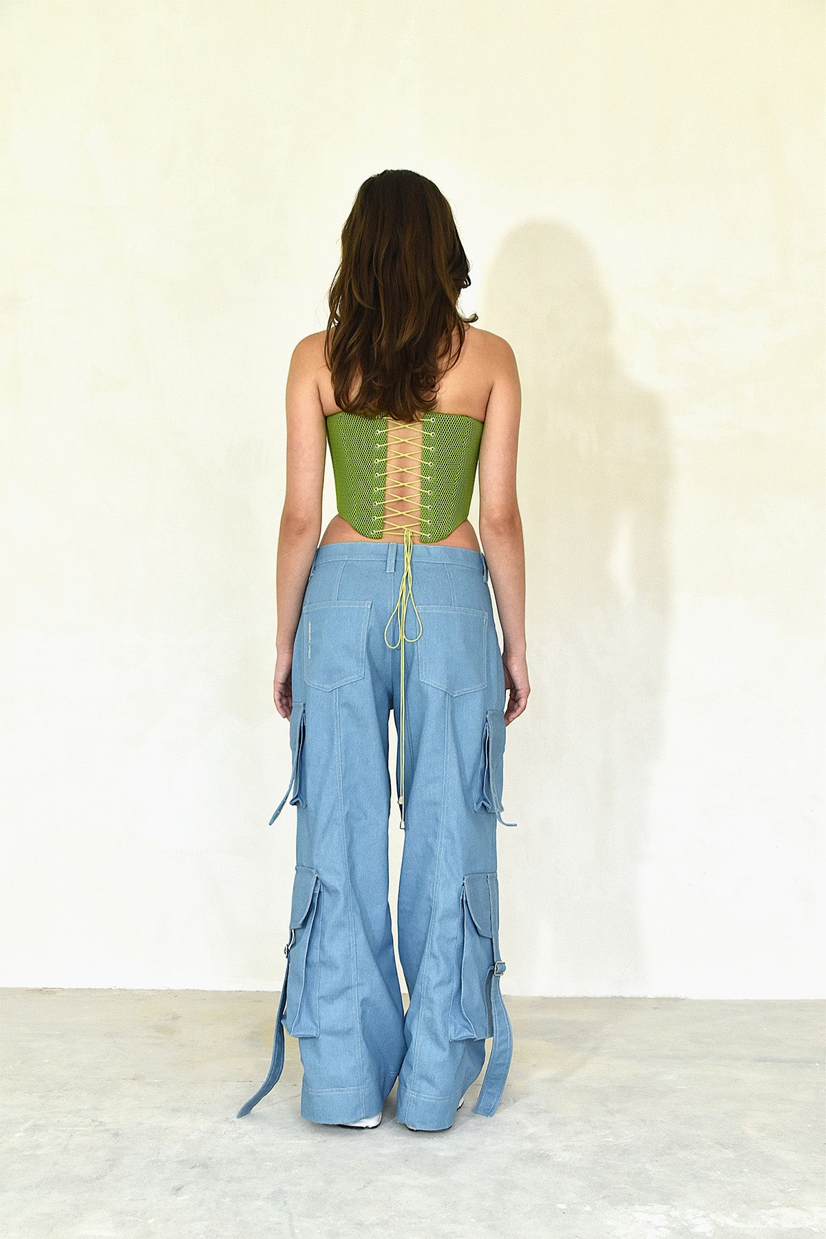 Green neoprene corset neutral pose back 